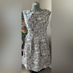 NWOT SM WARDROBE RETRO PRINT DRESS. HIDDEN ZIP, FULLY LINED, TIE BACK. CHARMING